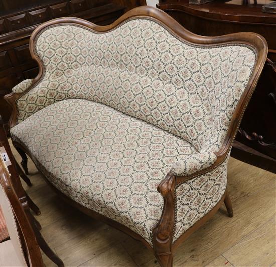 A French walnut showframe settee, W.176cm